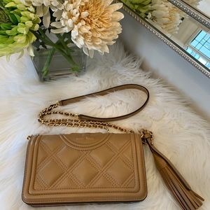 Tory Burch crossbody wallet.